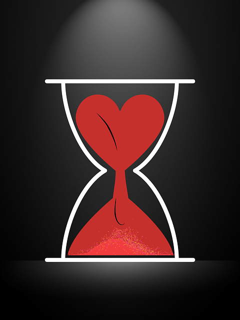 hourglass with heart representing time and relationships